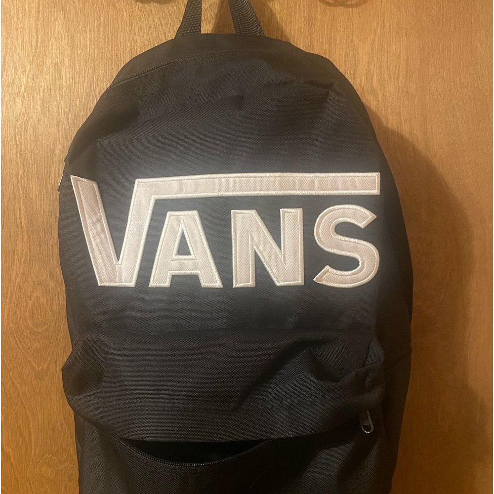 Gently used black Vans backpack